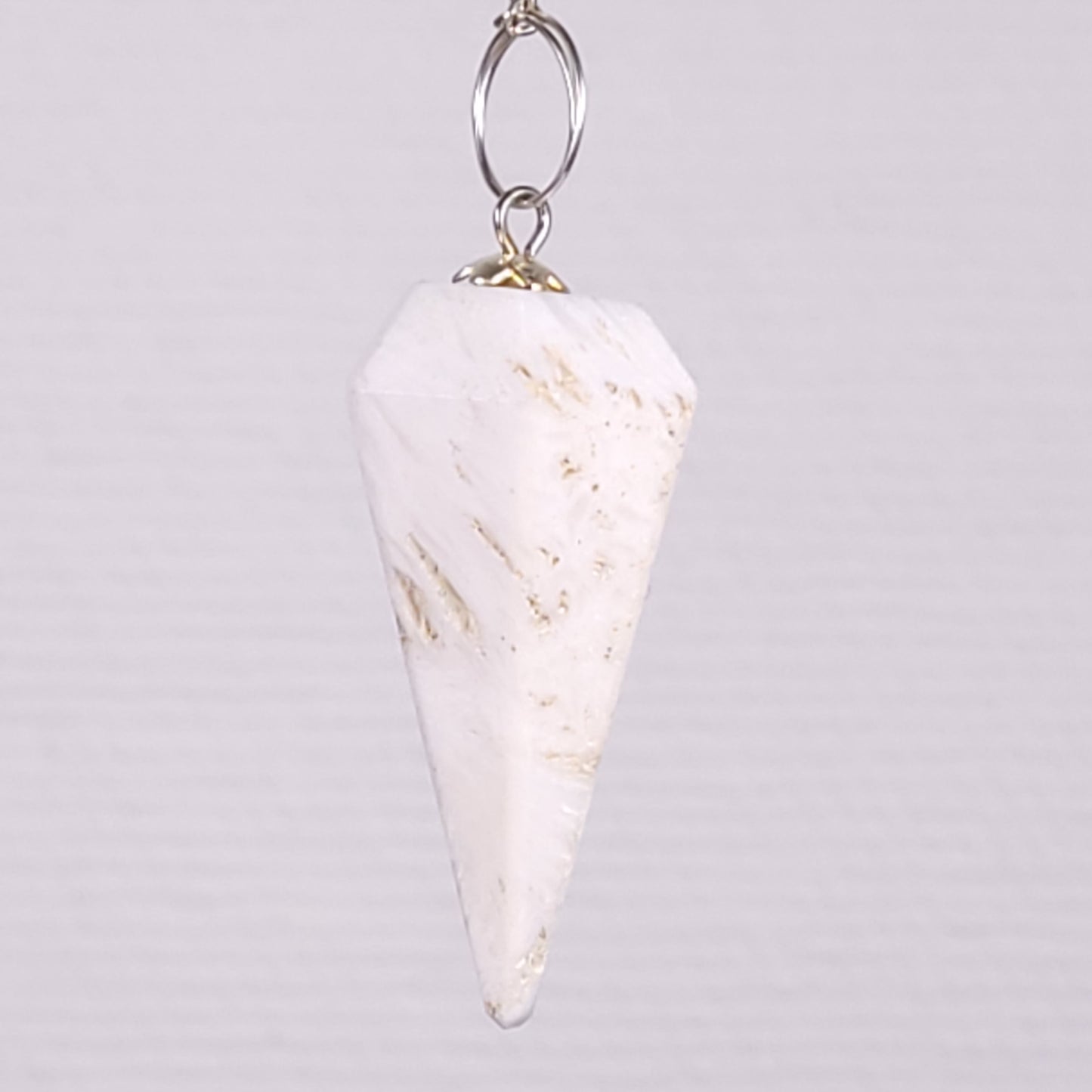 Pendule à facettes scolecite